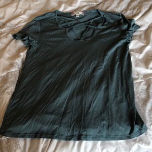 Cross straps in front of shirt